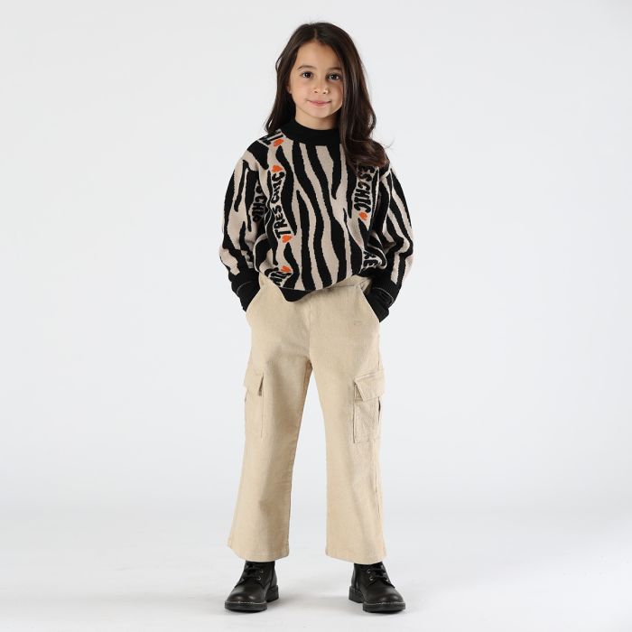 Maglione beige e nero