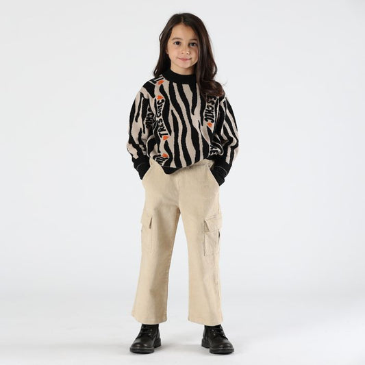 Maglione beige e nero